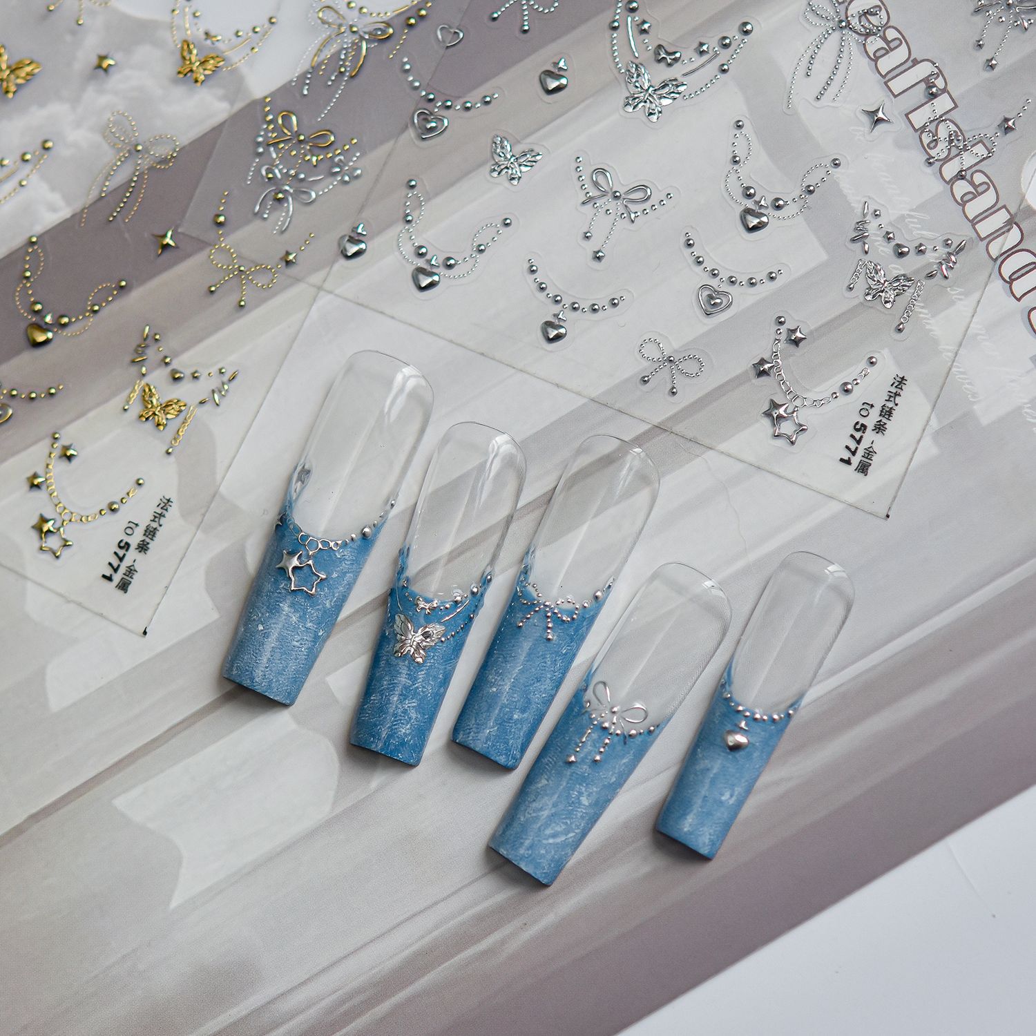 Exquisite Bow Metal Nail Stick - Gold Foil Flakes review and price